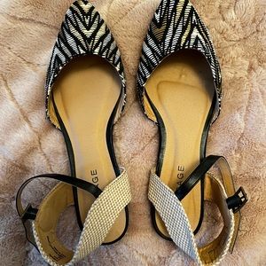 black and cream flats